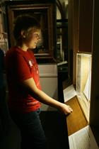 child using interactive book display