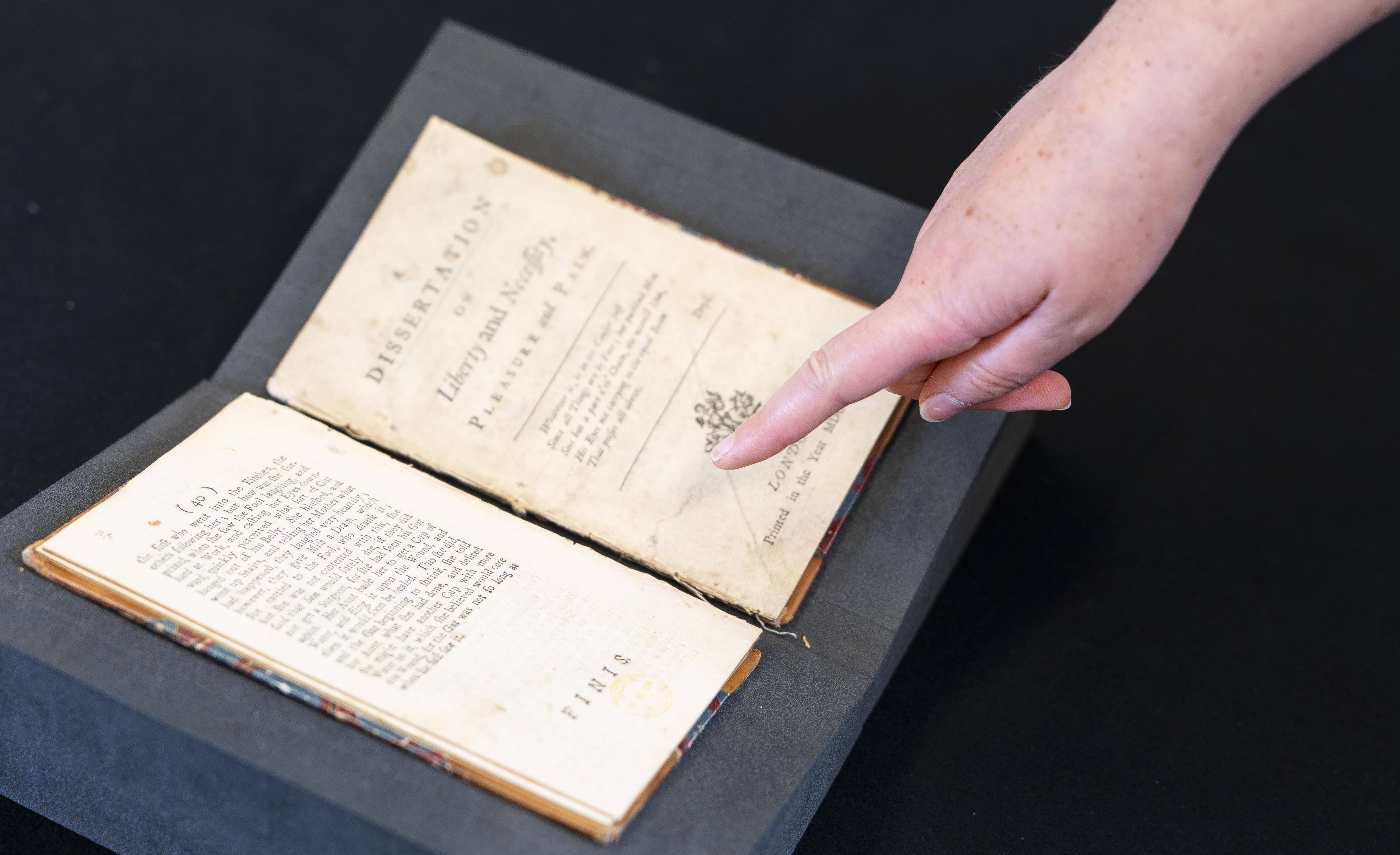 A printed pamphlet, separated into two halves.